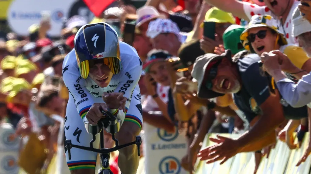 Unassailable Evenepoel dominates time trial; podium hopeful Lipowitz forced out of Tour