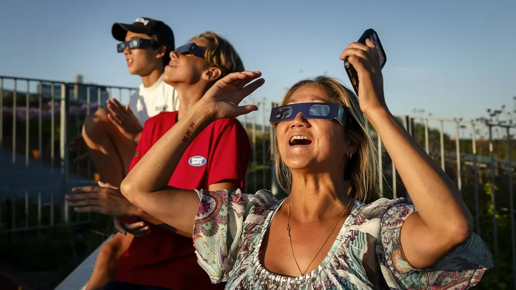 Dutch revel in the eclipse: 'Looks like a moon that gives light'