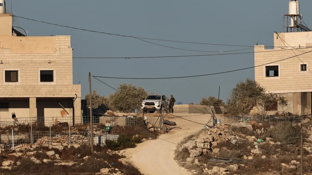 Israeli settlers blocked a Palestinian family's return to the West Bank